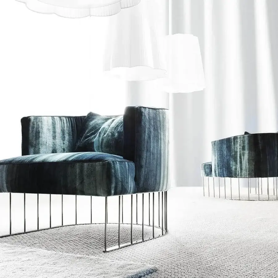 Captivating Erba Tentazione lounge chair upholstered in gradient blue-gray polyester fibre velveteen with a black chrome metal base