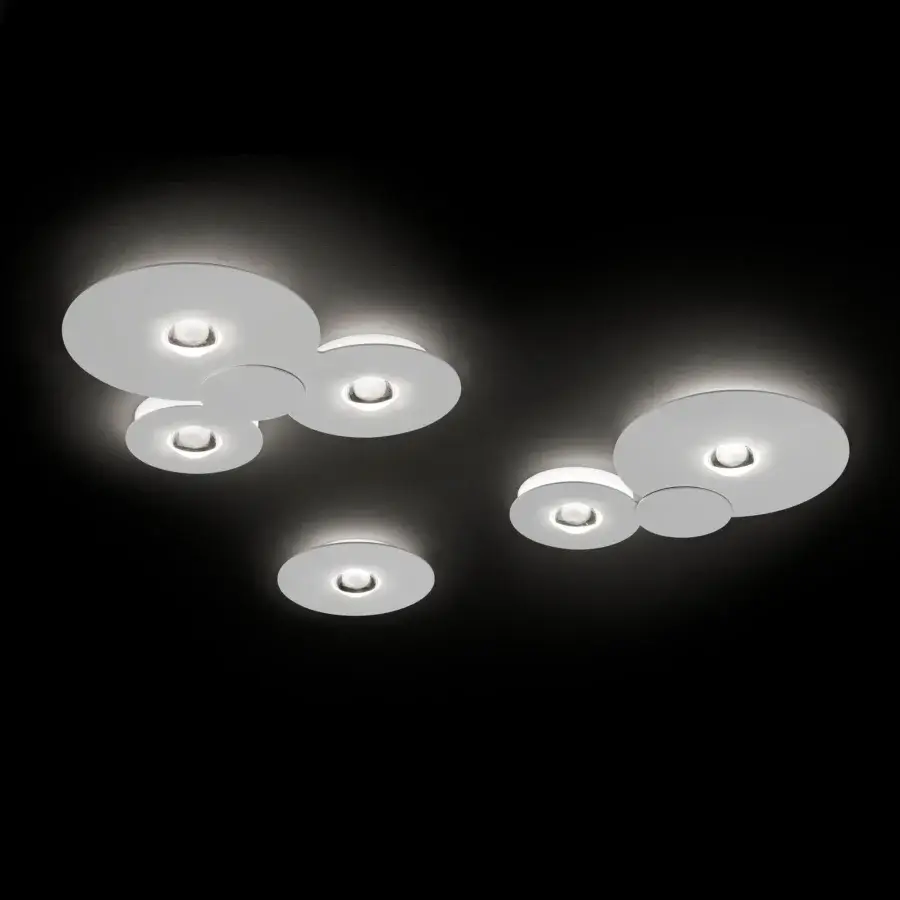 Elegant Lodes Bugia ceiling lamp with overlapping white disc forms crafted in Italy and matte finish