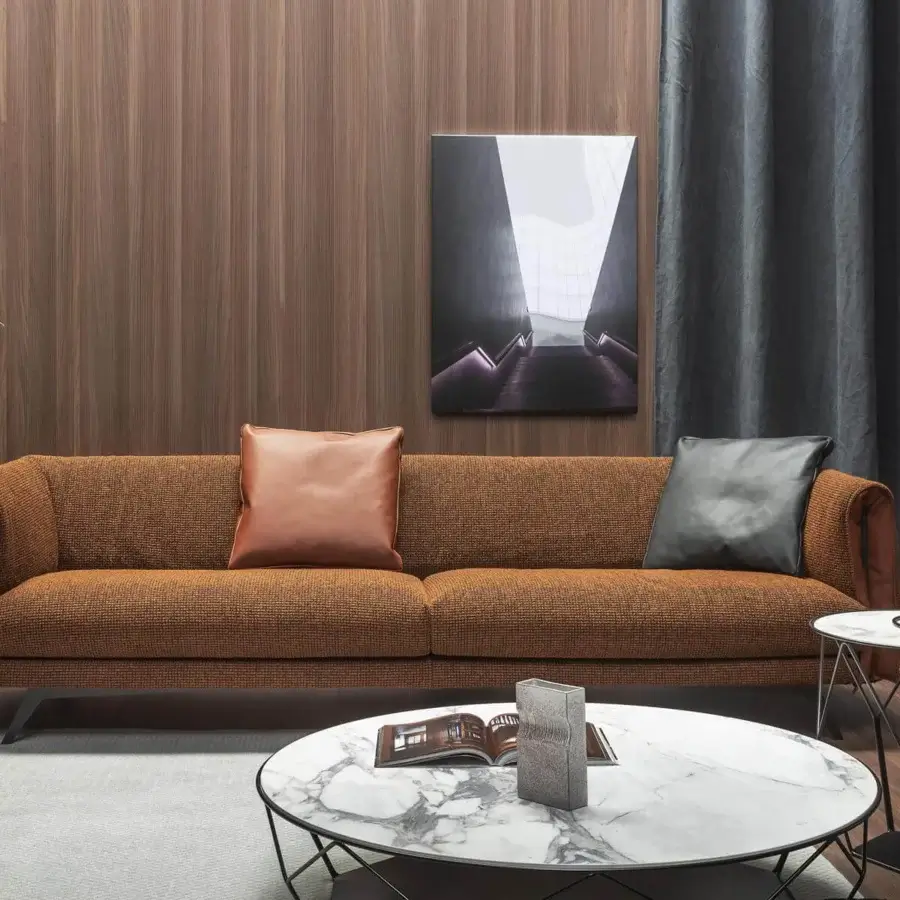 Superior Bonaldo Saddle sofa with tub-shaped details and textured brown textile upholstery complemented by smooth leather inserts with dark metal feet