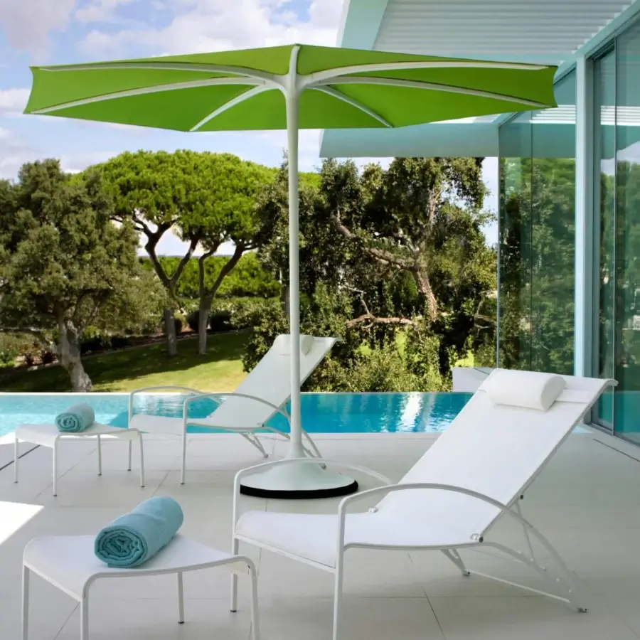 Distinguished Royal Botania Palma umbrella, a strutless shade crafted with white powder-coated aluminum and vibrant green woven acrylic fiber