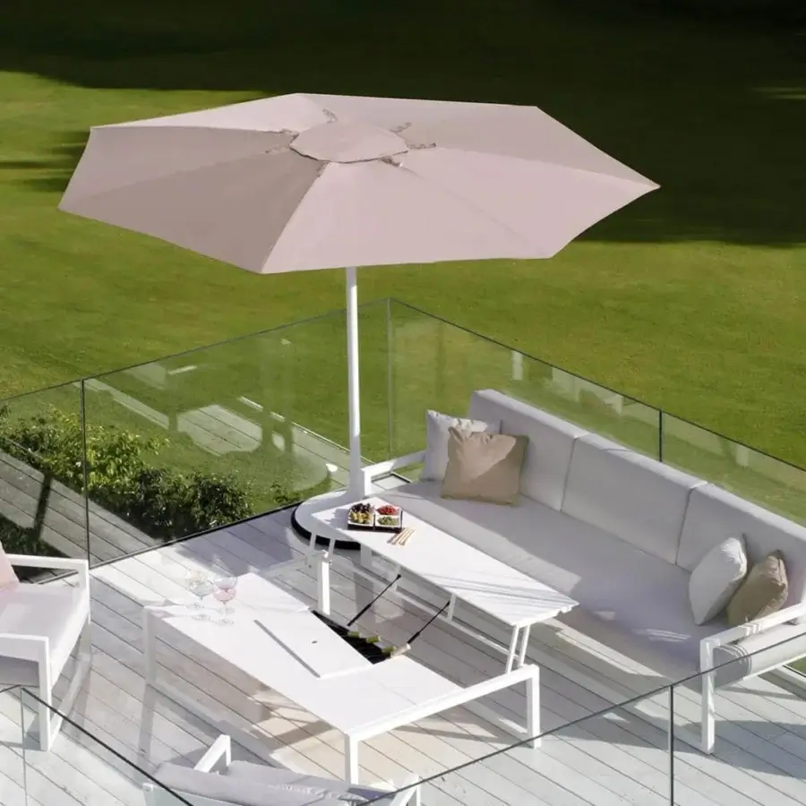 Innovative Royal Botania Palma umbrella, a strutless shade built with woven light beige acrylic fiber and white powder-coated aluminum