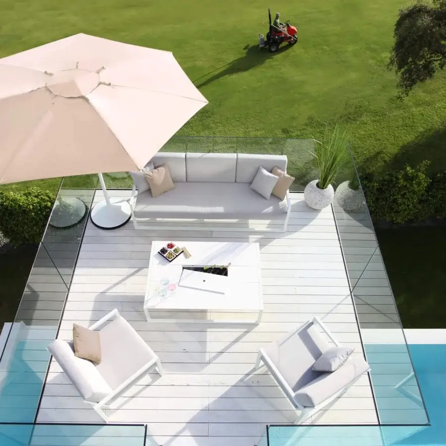 Superior Royal Botania Palma umbrella, a shade built with woven light beige acrylic fiber and white powder-coated aluminum pole with base