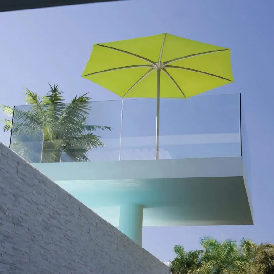 Exceptional Royal Botania Palma umbrella, a strutless design with a chartreuse Textile Cat canopy and powder-coated aluminum pole