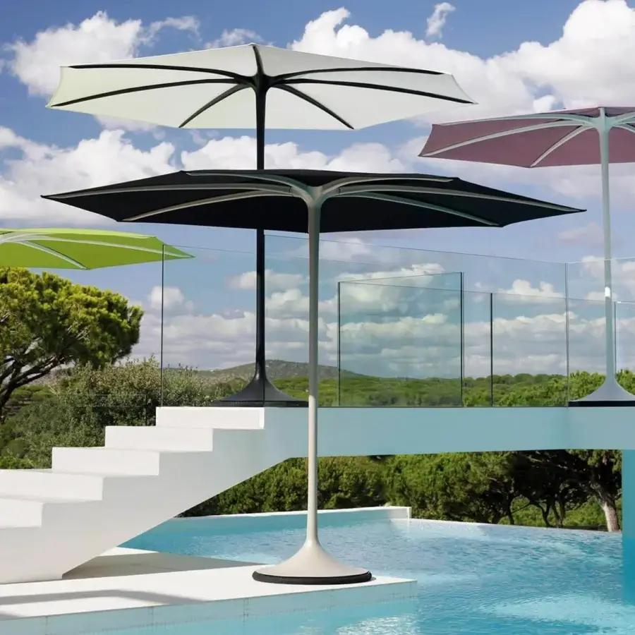Innovative Royal Botania Palma umbrella, a strutless shade built with green Textile Cat fabric and a matte coated aluminum pole