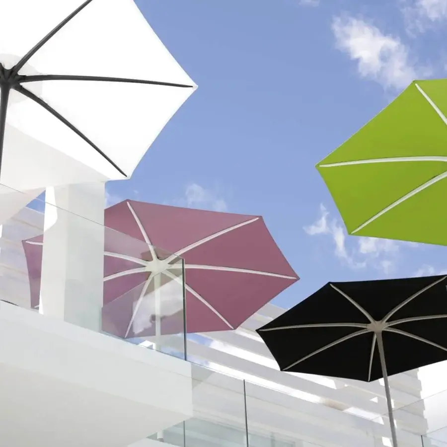 Superior Royal Botania Palma umbrella, a strutless shade with black acrylic textile and aluminum pole built with a powder-coated finish