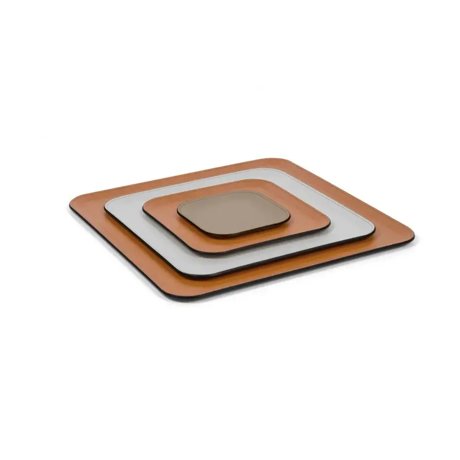 Pinetti Victor Square Trays, tan leather and dark taupe, nested geometric design studio shot.
