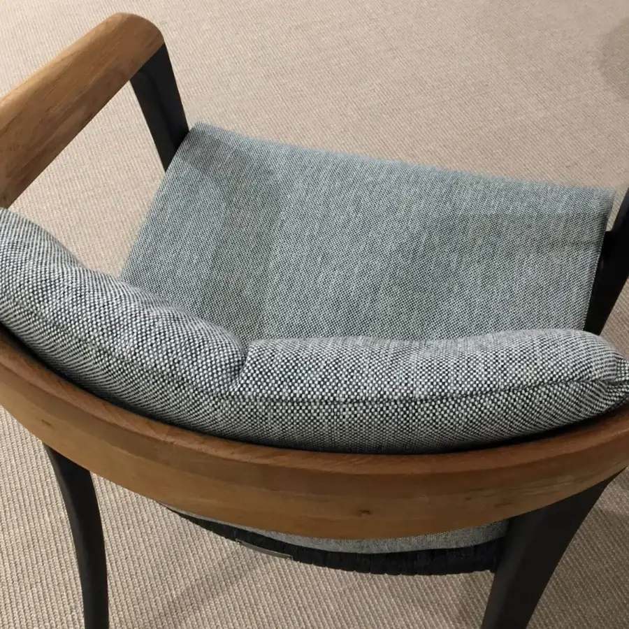 Distinguished Royal Botania Jive armchair crafted with tapered aluminum, teak, and woven olefin with quick-dry foam padding