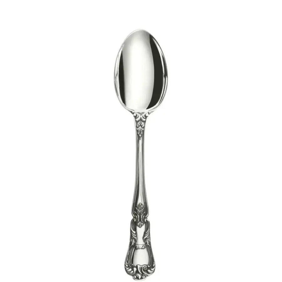 Silver spoon with polished oval bowl and ornate handle featuring scrolling floral patterns, against a white backdrop.