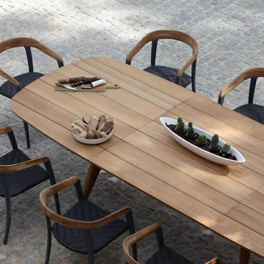 Distinguished Royal Botania Zidiz table crafted from teak wood with a light warm brown finish showcasing subtle grain