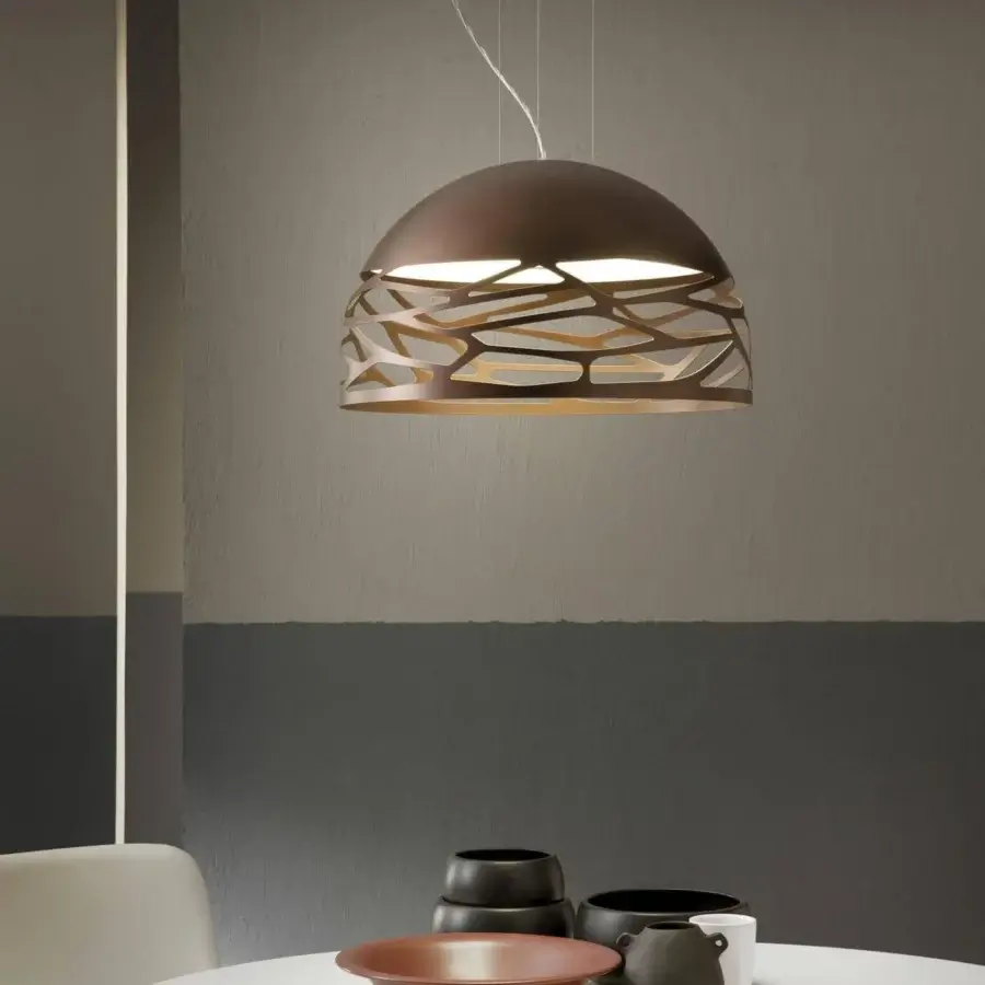 Exceptional Lodes Kelly Dome suspension lamp crafted in coppery bronze matte metal with gold-toned interior and organic cut-out patterns