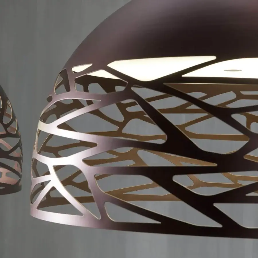 Superior Lodes Kelly Dome suspension lamp crafted in coppery bronze matte metal with glossy white glass diffuser and intricate laser-cut openings