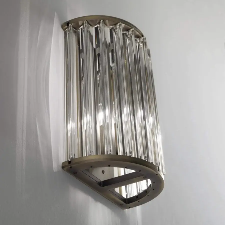 Exclusive VENICEM Crown wall lamp with a refined metal structure in light burnished brass and clear Murano blown glass trihedrons