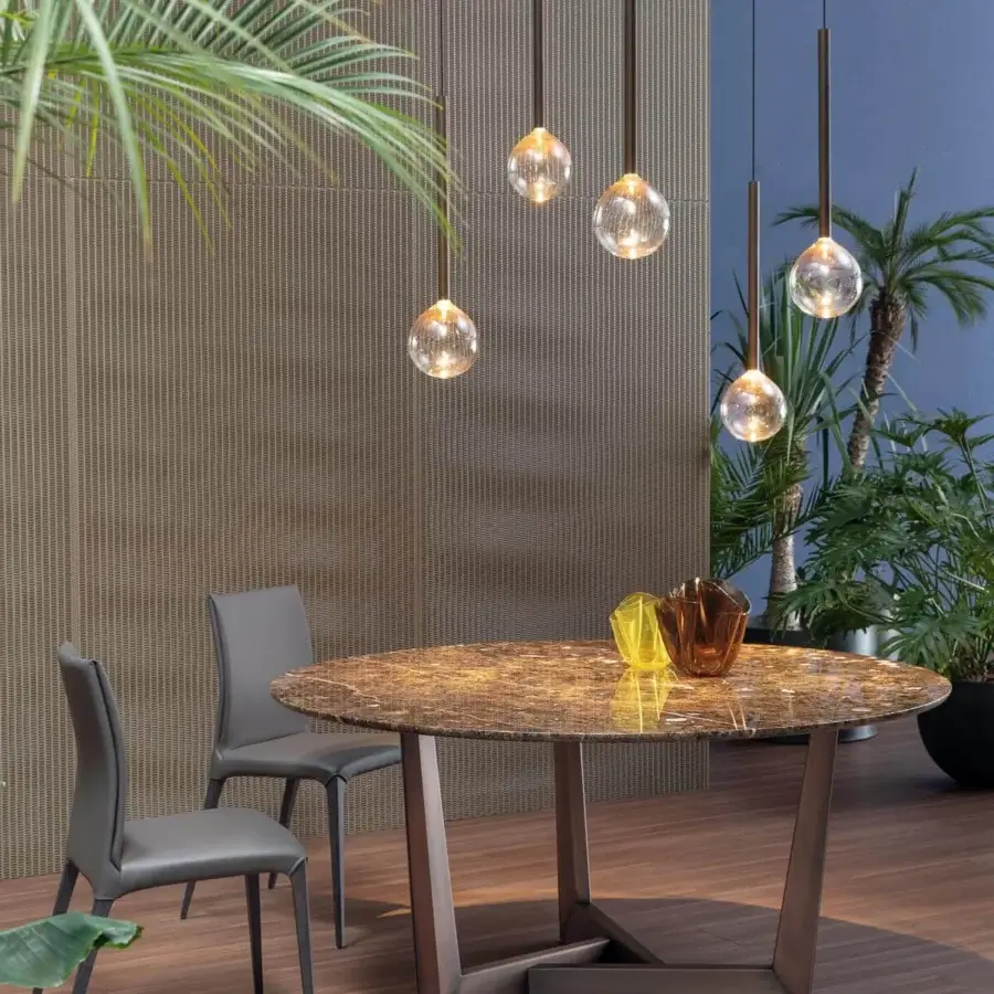 Distinguished Bonaldo Art table with a captivating brown and tan patterned ceramic top and geometric metal base crafted in a matching brown finish