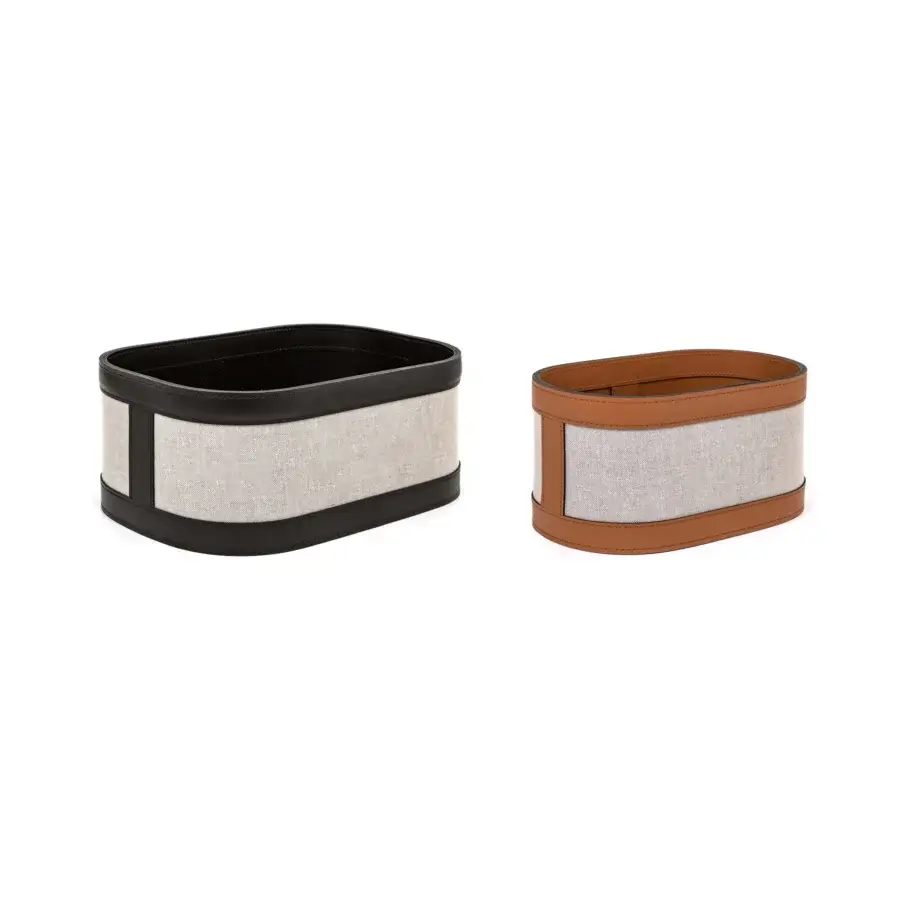 Pinetti Penelope towel baskets, black and tan leather, rectangular shape with woven gray fabric panel and rounded corners.