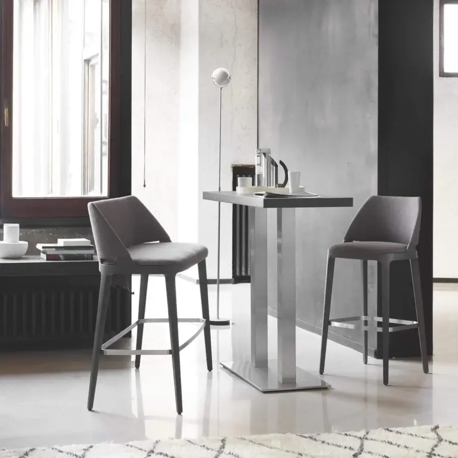Superior Potocco Velis stool with ash legs and metal footrest, upholstered in fire retardant polyurethane foam with a matte gray finish