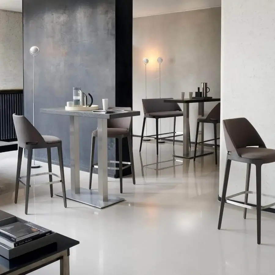 Distinguished Potocco Velis stool with dark gray textile upholstery and ash legs crafted with a metal footrest