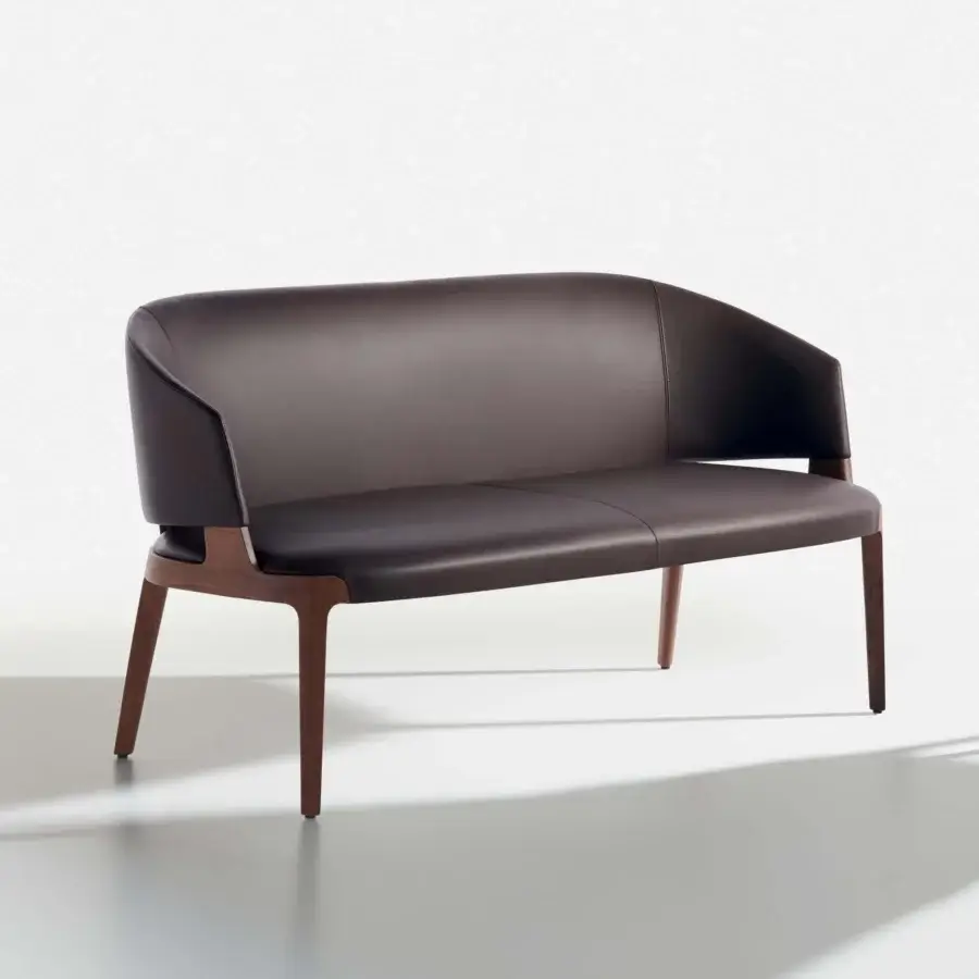 Distinguished Potocco Velis sofa with enveloping seat, dark brown upholstery and Canaletto walnut frame built with angled legs