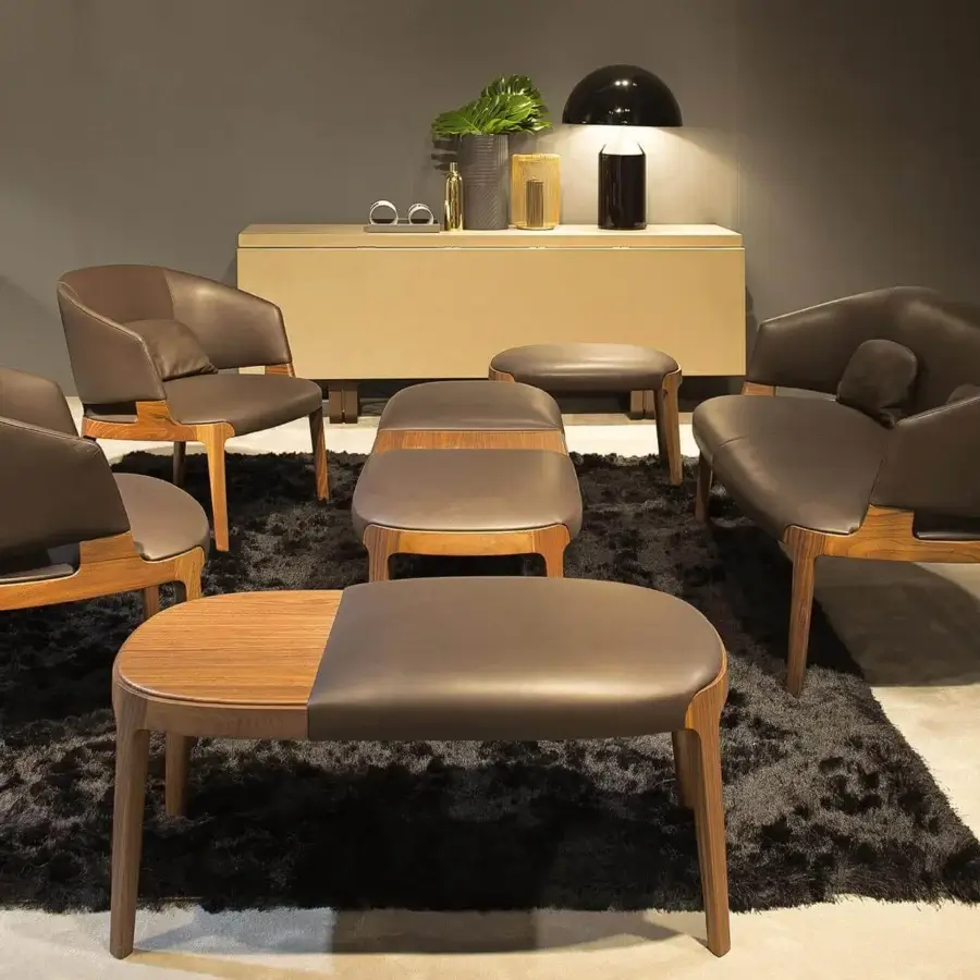 Refined Potocco Velis bench with Canaletto walnut structure and brown faux leather padded seating exhibiting a tonal contrast