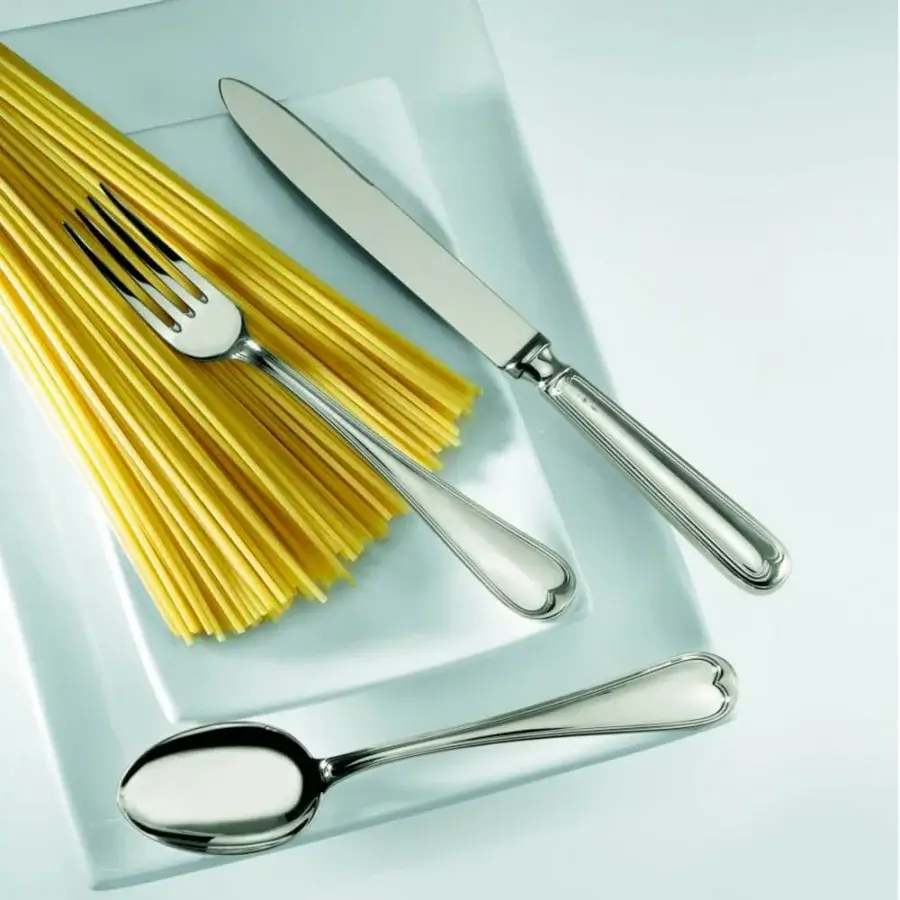 Distinguished Schiavon Mauriziano dessert cutlery crafted in silver-plated alpaca with a bright polished finish and subtle heart detailing