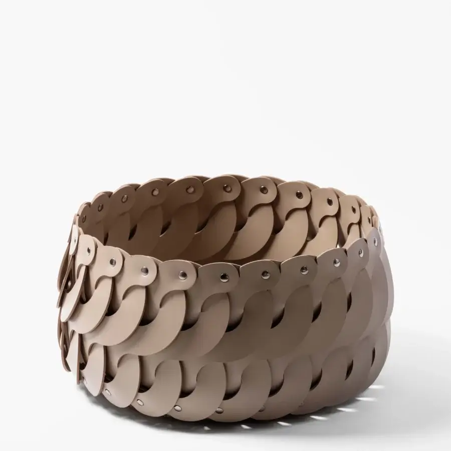 Architectural Pinetti Alicante baskets with lid crafted in washable beige leather offering a rhythmic scale-like design