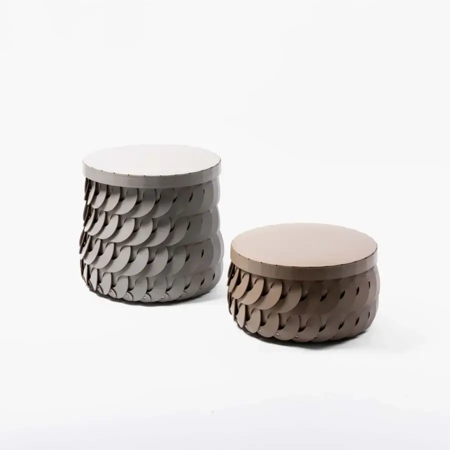 Distinguished Pinetti Alicante baskets with lid crafted in washable gray-brown leather exhibiting a textured petal design secured with metal pins