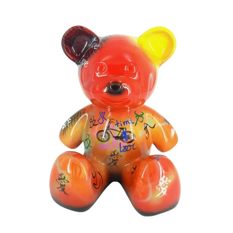Exclusive Juliarte Teddy sculpture crafted in stone powder and fiberglass with vibrant red and orange graffiti markings