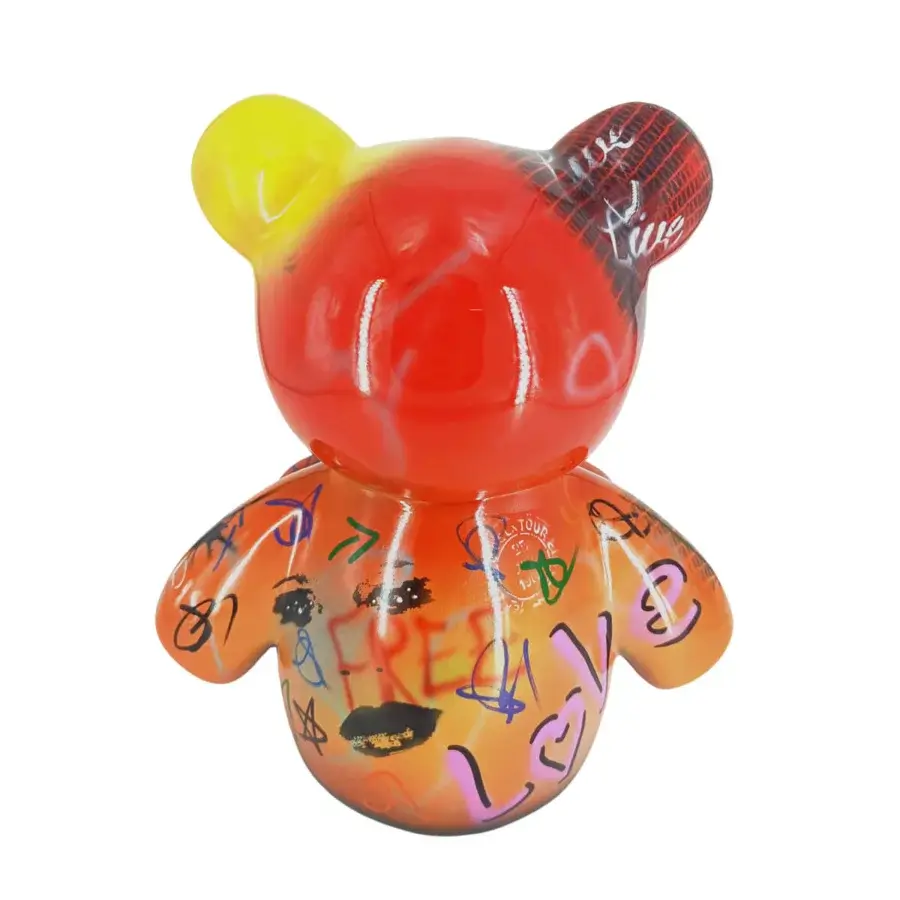 Exceptional Juliarte Teddy sculpture crafted in translucent red stone powder and fiberglass with glossy graffiti markings