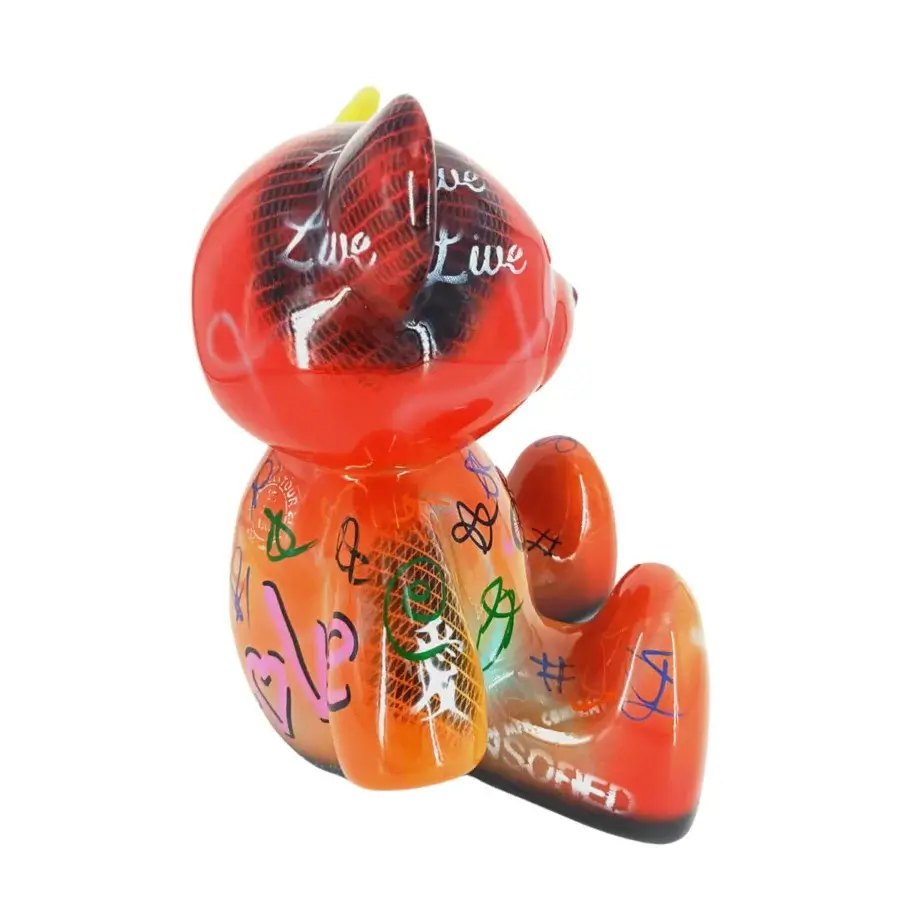 Exclusive Juliarte Teddy sculpture crafted in vibrant red with a glossy, snakeskin-inspired stone powder and fiberglass composition