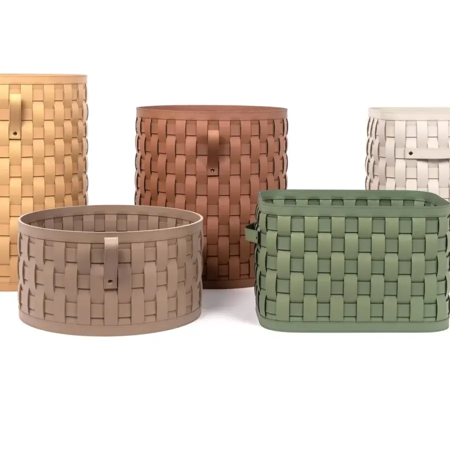 Exceptional Pinetti Demetra baskets hand-woven from upcycled leather in a matte yellow hue with functional handles