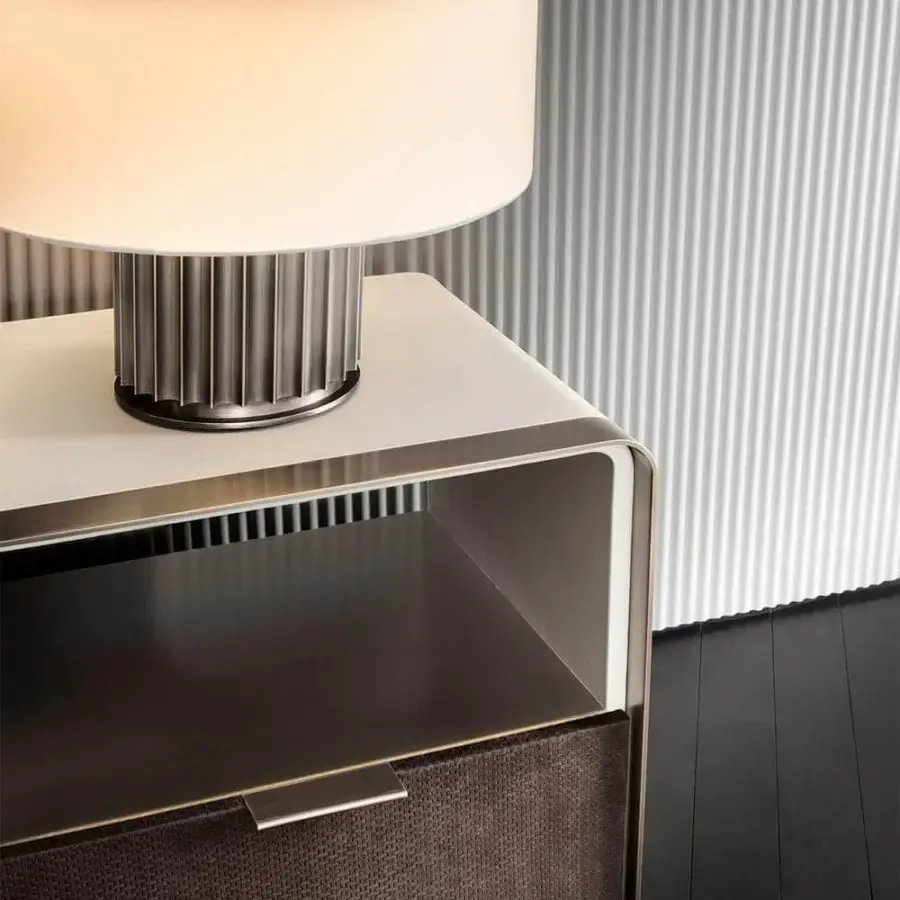 Distinctive Rugiano Grace nightstand crafted in woven brown textile and refined leather with bronze details