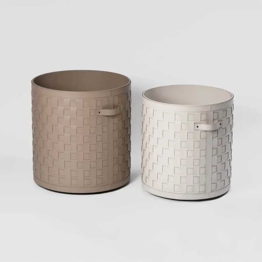 Refined Pinetti Demetra baskets with wheels showcase hand-woven eco-friendly leather in muted beige and off-white with a matte finish