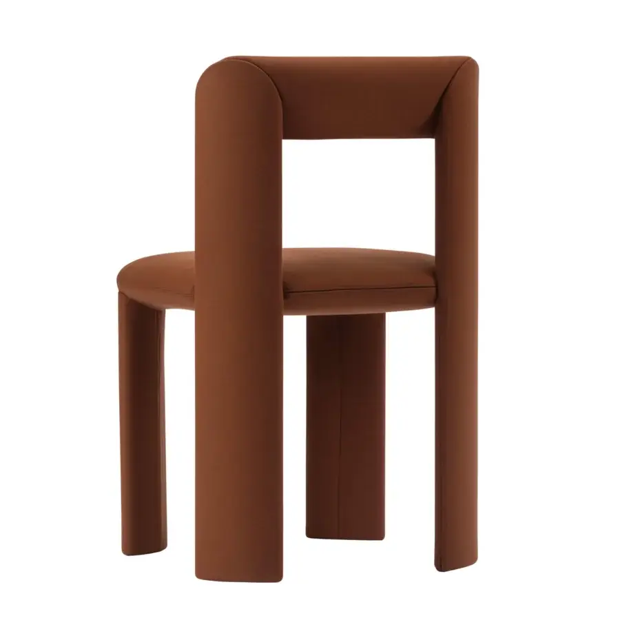Superior Miniforms Amia chair with warm earthy brown textured fabric and subtly squared backrest detailing built with crossed legs