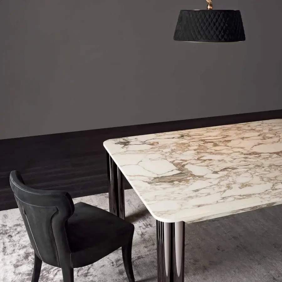 Exclusive Rugiano Forest table with creamy marble top exhibiting beige, brown, and green veining and highly polished chrome metalwork