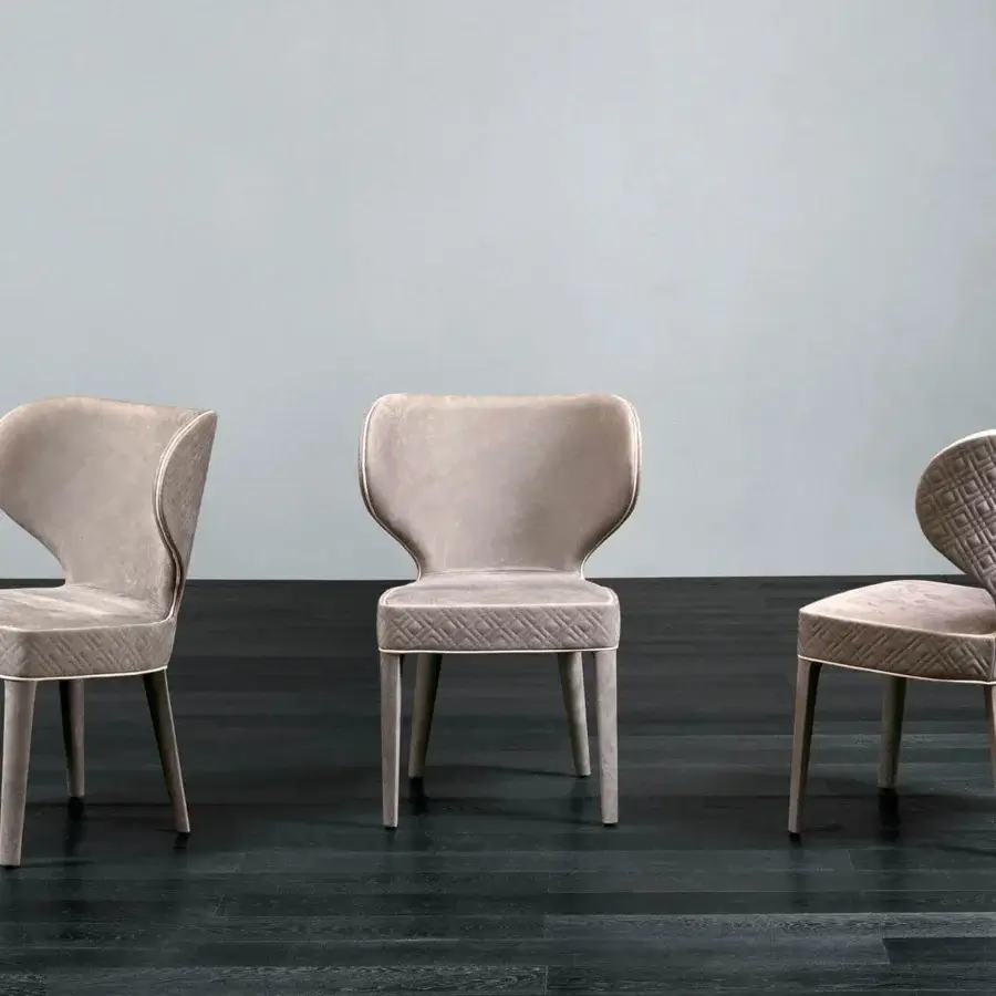 Distinctive Rugiano Aida chair with neutral beige luxurious fabric upholstery and lacquered slender legs