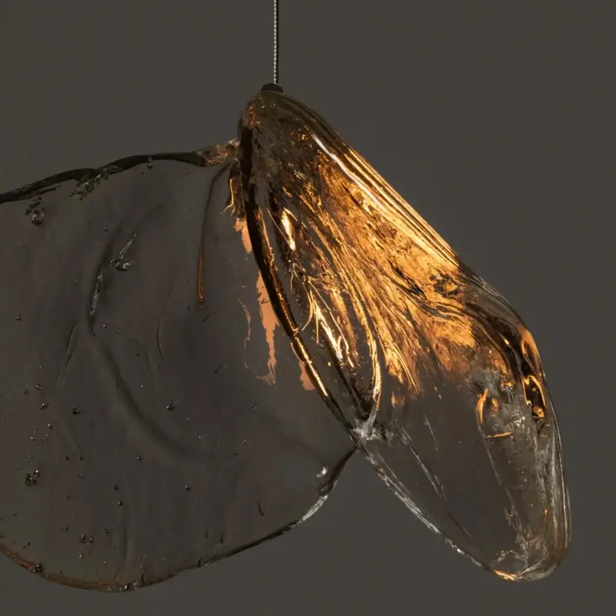 Distinguished Bocci 141 single suspension lamp crafted in warm amber glass with subtle transparency and coaxial cable system