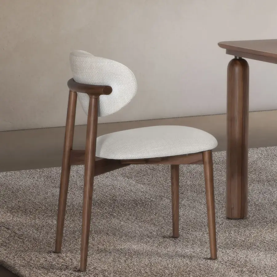 Refined Pacini & Cappellini Camilla chair with solid ash wood structure and light beige upholstery in satin finish