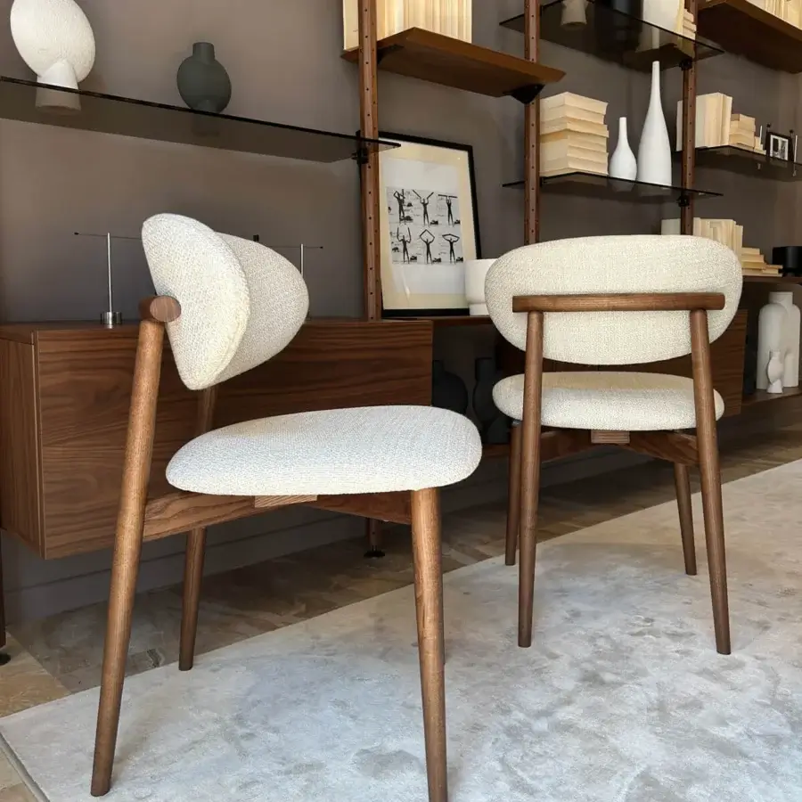Distinguished Pacini & Cappellini Camilla chair with solid ash wood and neutral beige textile upholstery in a satin finish