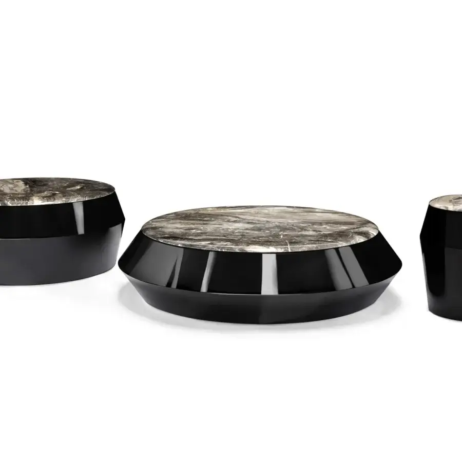 Distinguished Arketipo Ufo coffee table with a polished black base and mottled gray beige stone-like tabletop