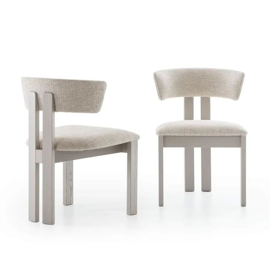 Pacini&Cappellini Ines chairs, beige textured fabric, with differing backrest styles—curved solid versus horizontal bar—and light gray wood frames.