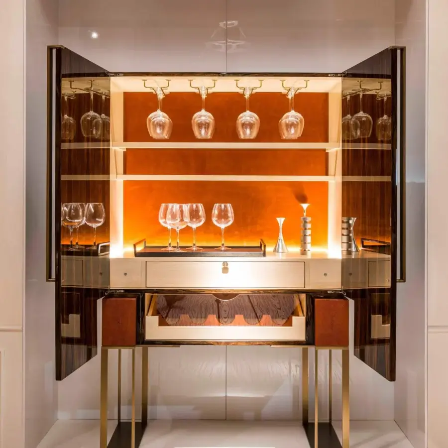 Superior OAK Montenapoleone bar cabinet with polished green ebony structure and refined brushed metal base, lined in leather with glass shelving