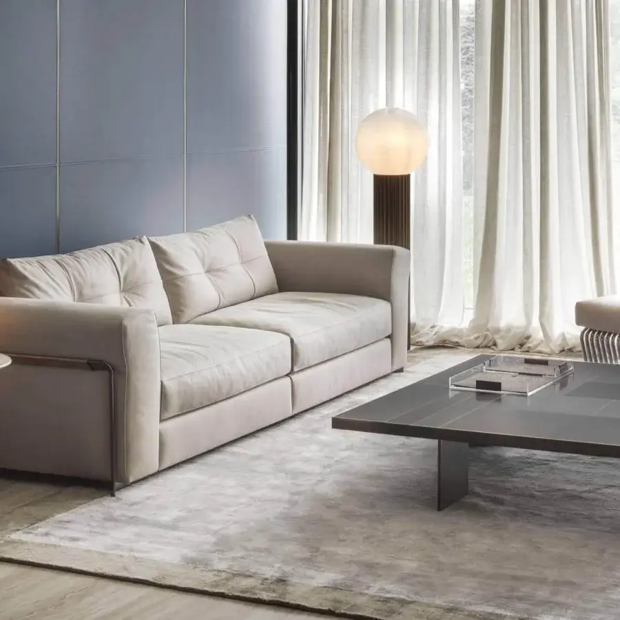 Superior Rugiano Arthur sofa upholstered in light beige textile with smooth matte finish and black chrome armrests
