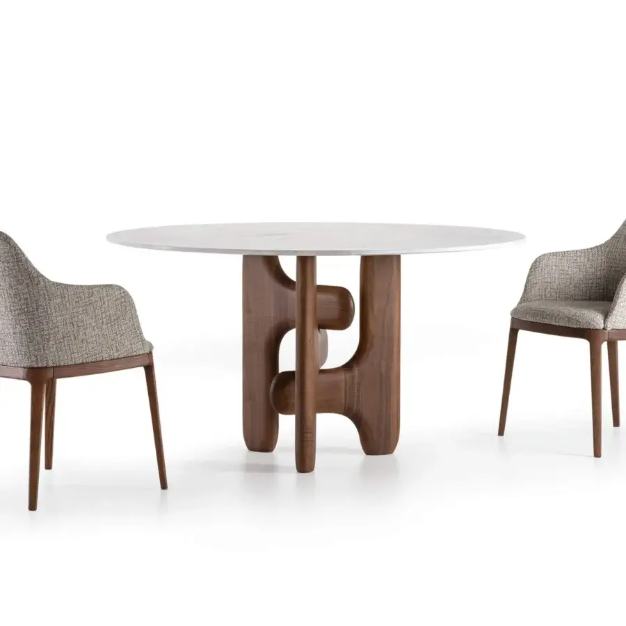 Elegant Pacini & Cappellini Clifford table with a polished natural marble top and solid Canaletto walnut base