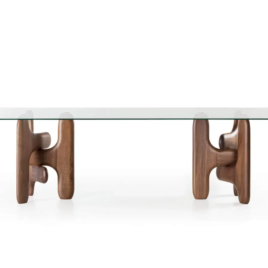 Distinguished Pacini & Cappellini Clifford table with a polished natural marble top and solid Canaletto walnut base in medium-dark tones with a satin sheen