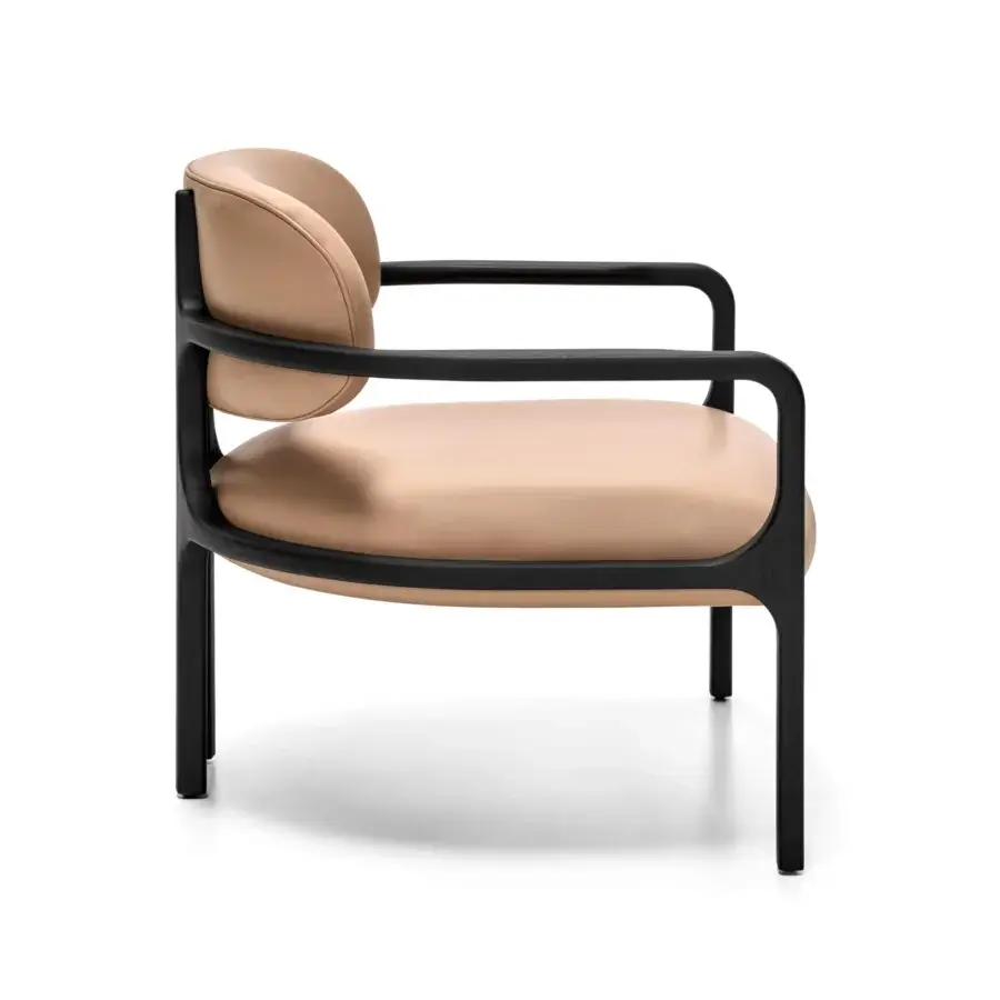 Exceptional Arketipo Brasilia lounge chair with black ash wood structure and light tan textile upholstery