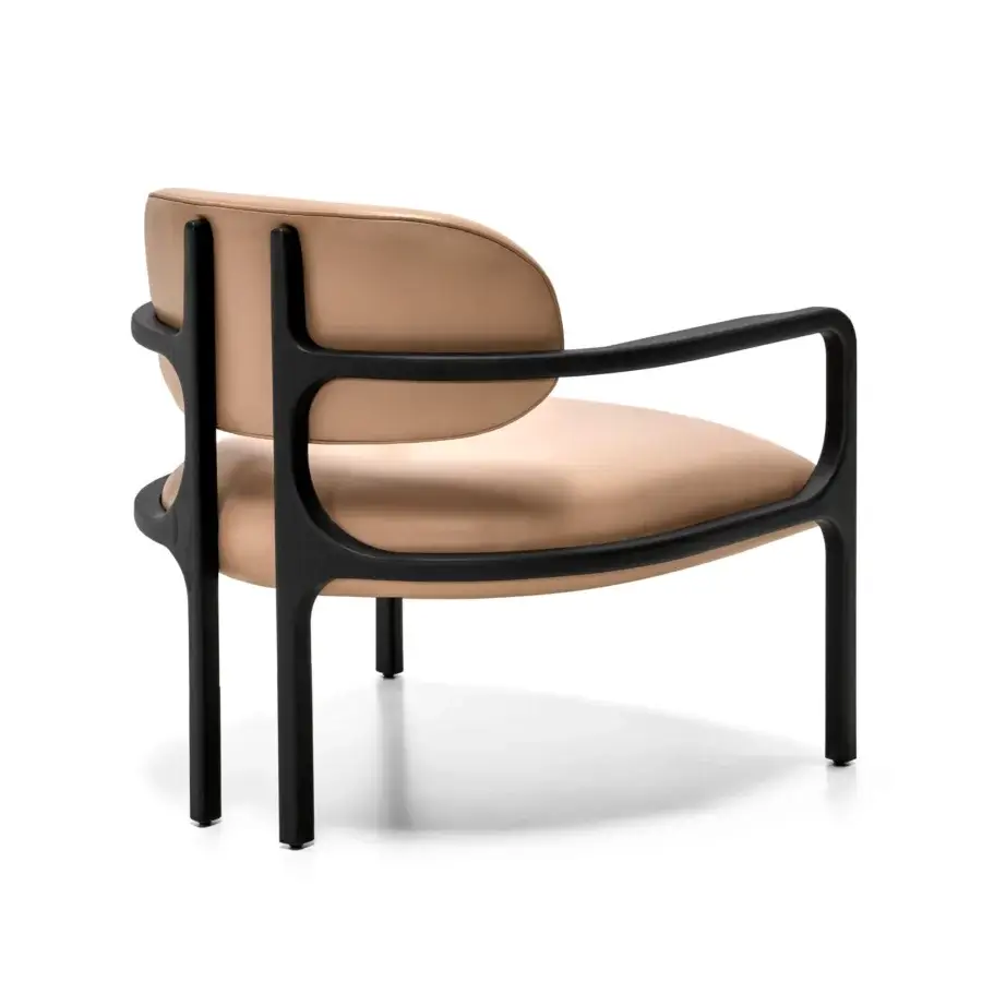 Elegant Arketipo Brasilia lounge chair in black ash wood with tan synthetic upholstery and flowing form