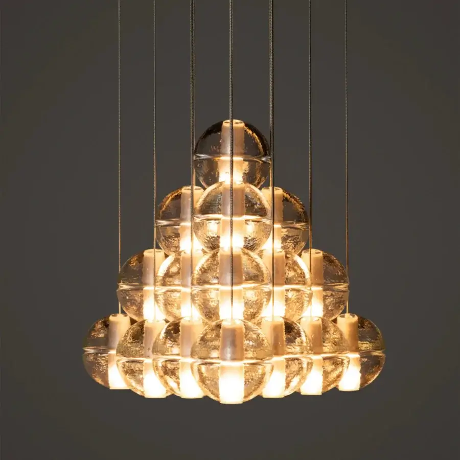 Distinguished Bocci 14 Geometric suspension lamp crafted in layered transparent glass exhibiting amber and golden tones with a coaxial cable system
