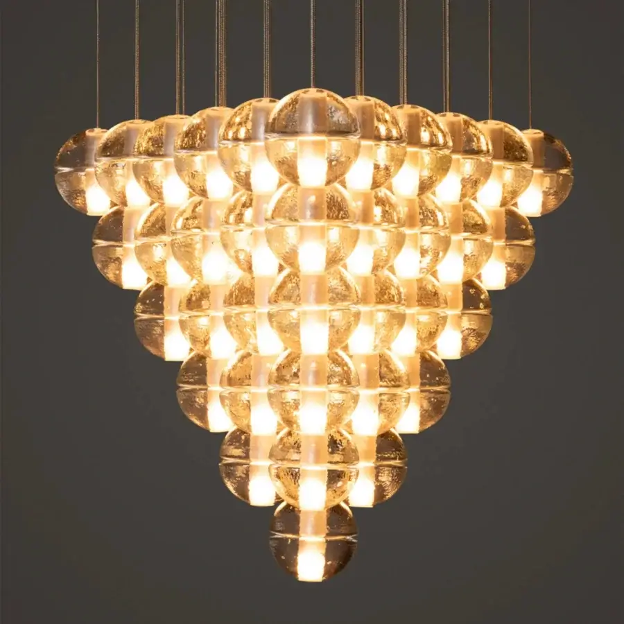 Exceptional Bocci 14 Geometric suspension lamp with translucent glass spheres and delicate metallic cables emitting a warm amber glow