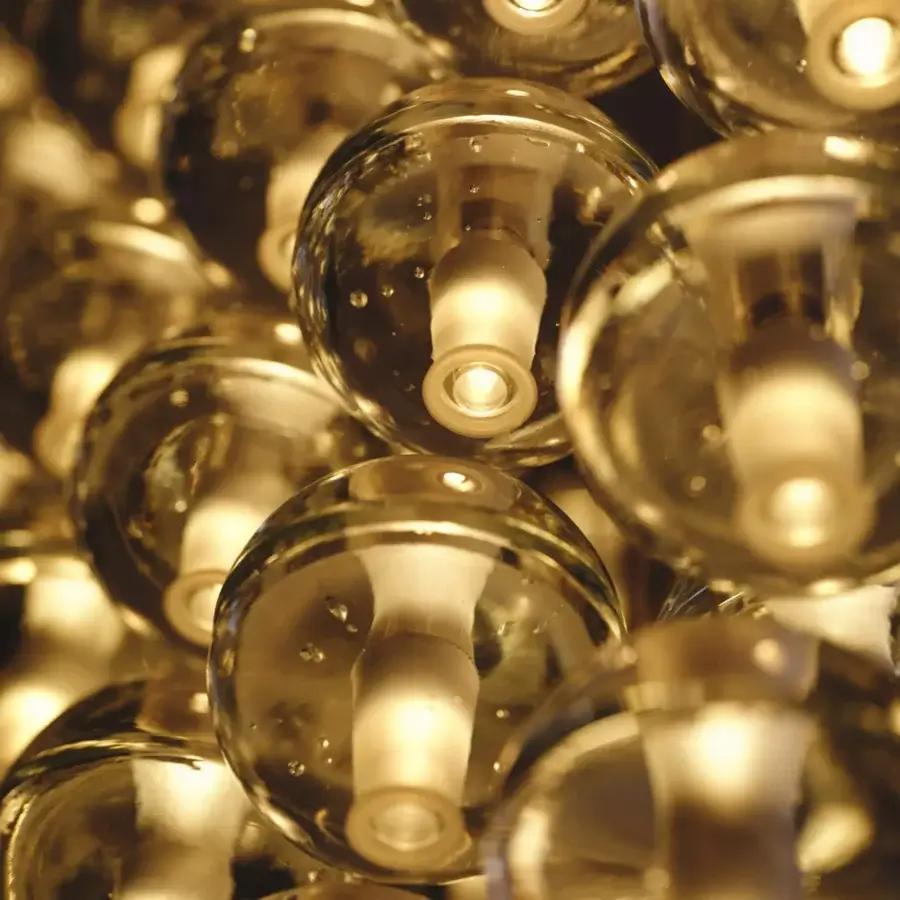 Distinguished Bocci 14 Geometric suspension lamp with hand-blown glass spheres and warm golden hue crafted in a contemporary style