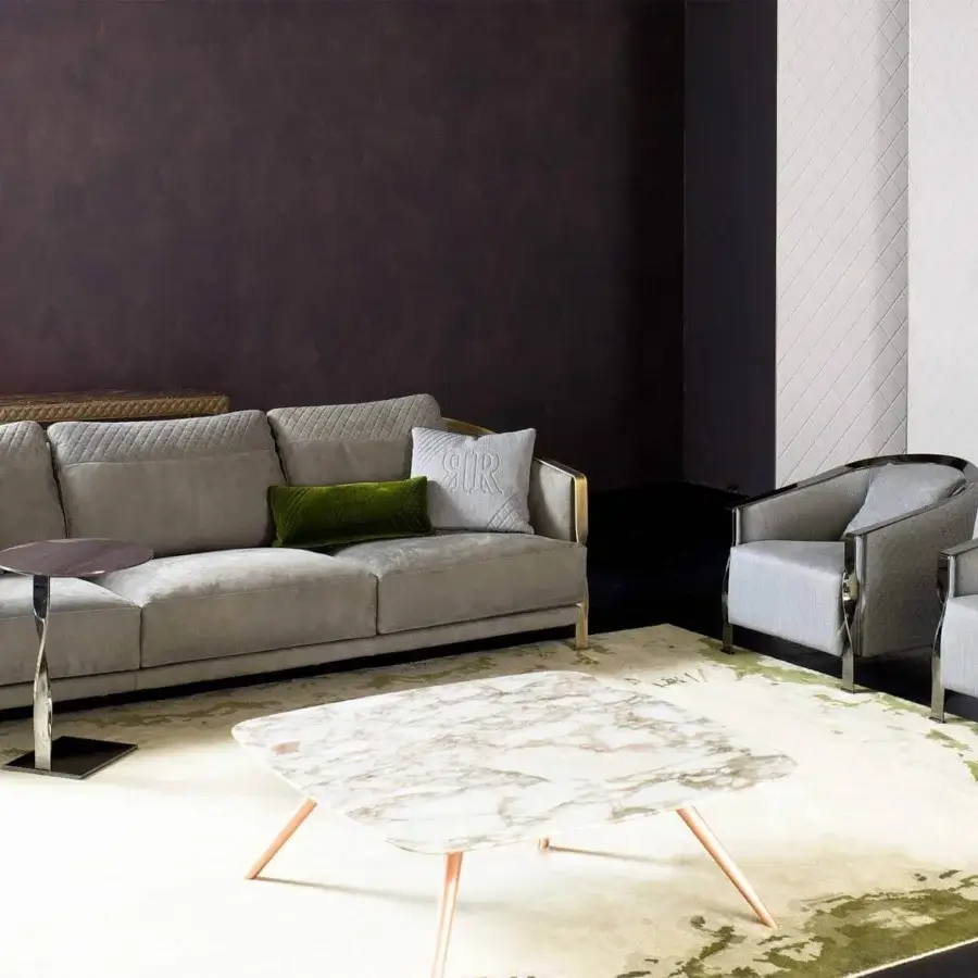 Lavish Rugiano Paris lounge chair with light gray textile upholstery and polished twisted metal structure