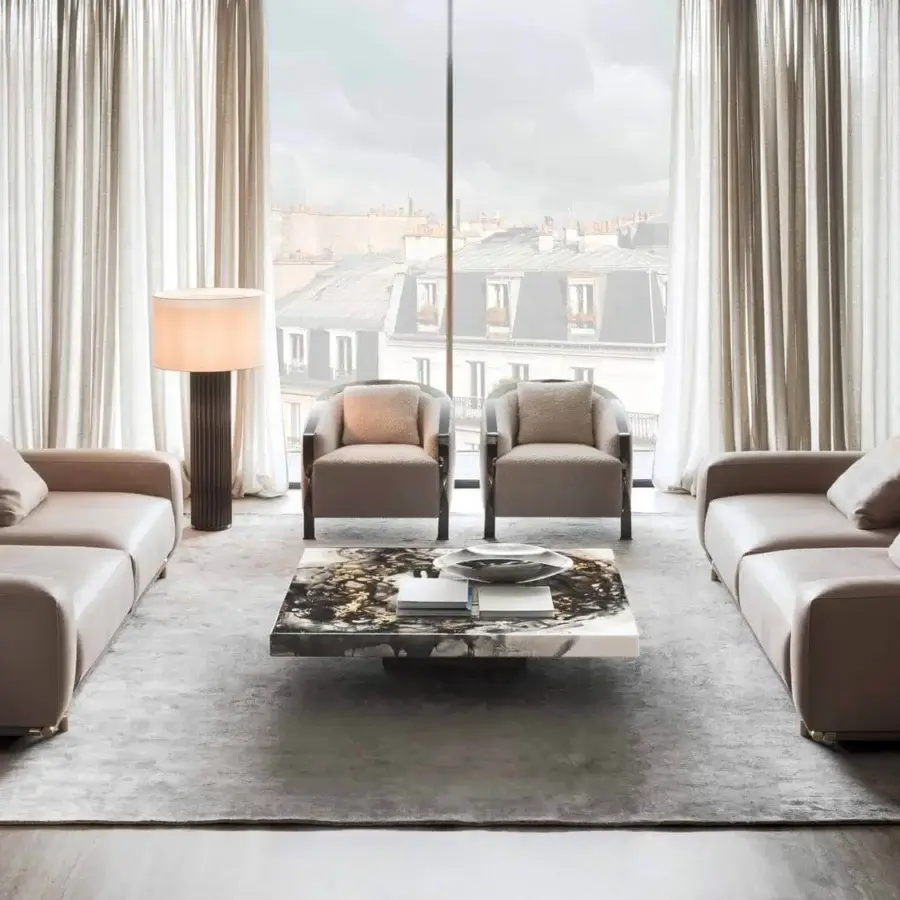 Superior Rugiano Paris lounge chair with light beige textile upholstery and twisted dark-toned metal structure